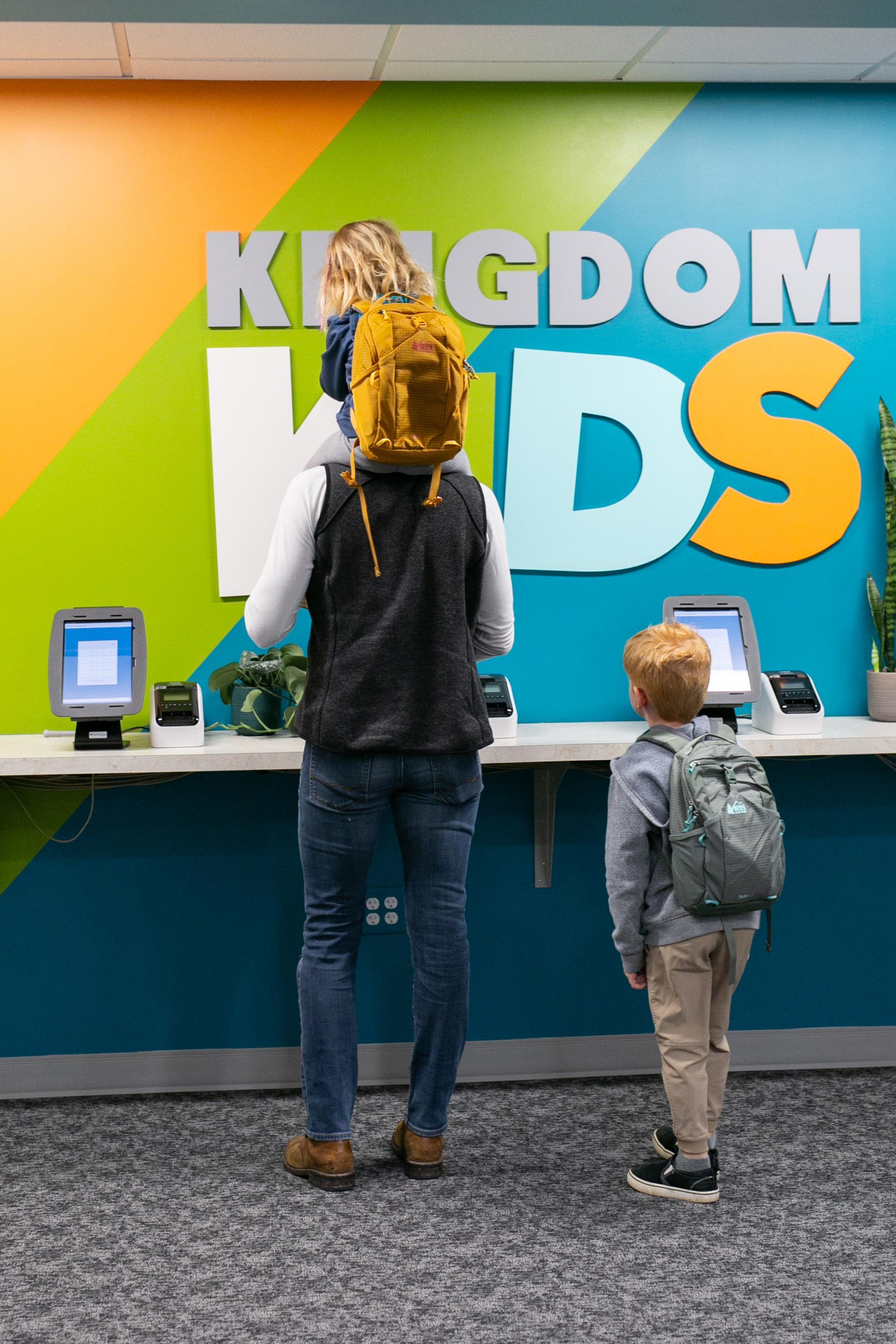 Kids check-in for Kingdom Kids.