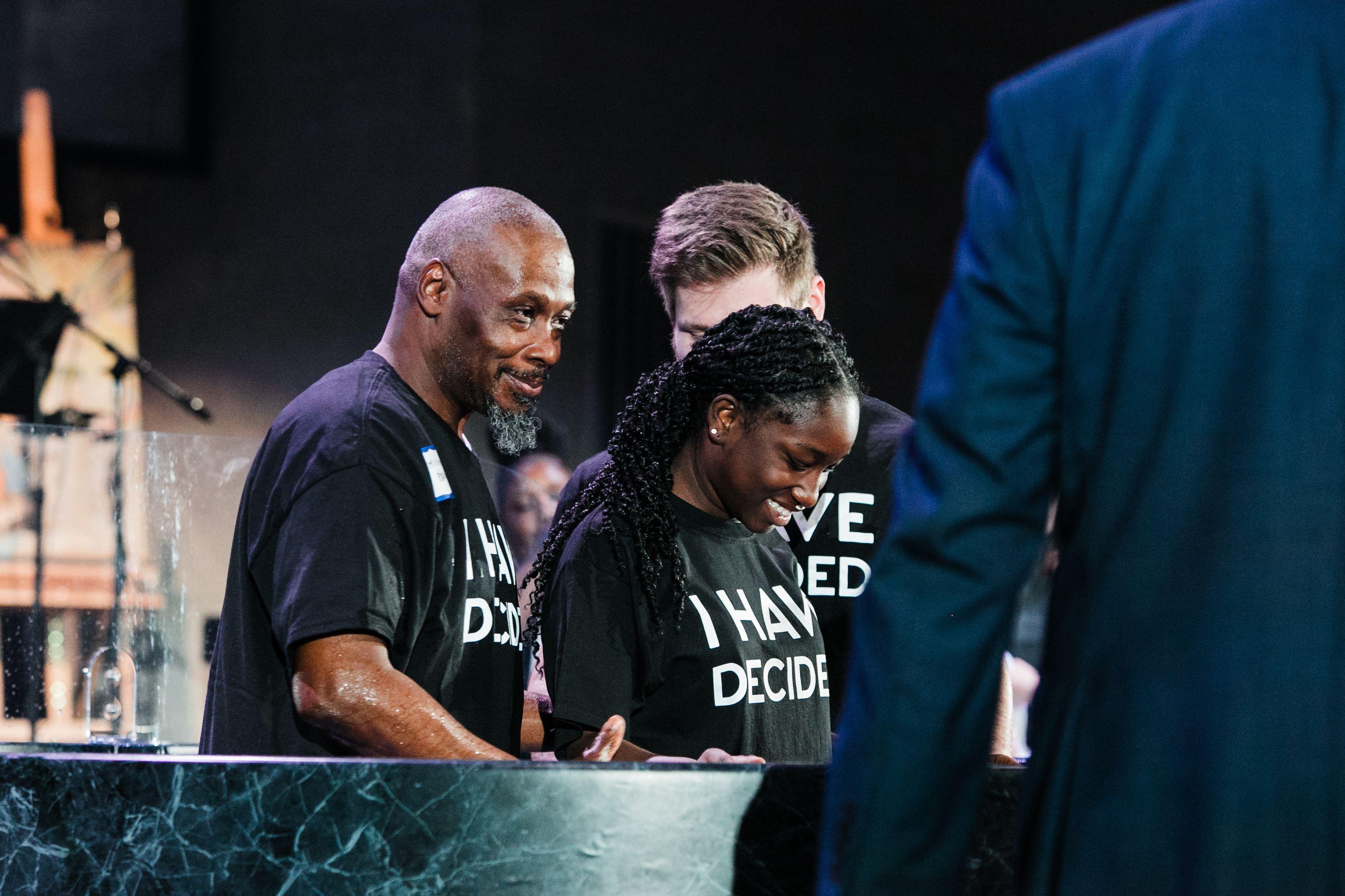 Woman getting baptized at church.